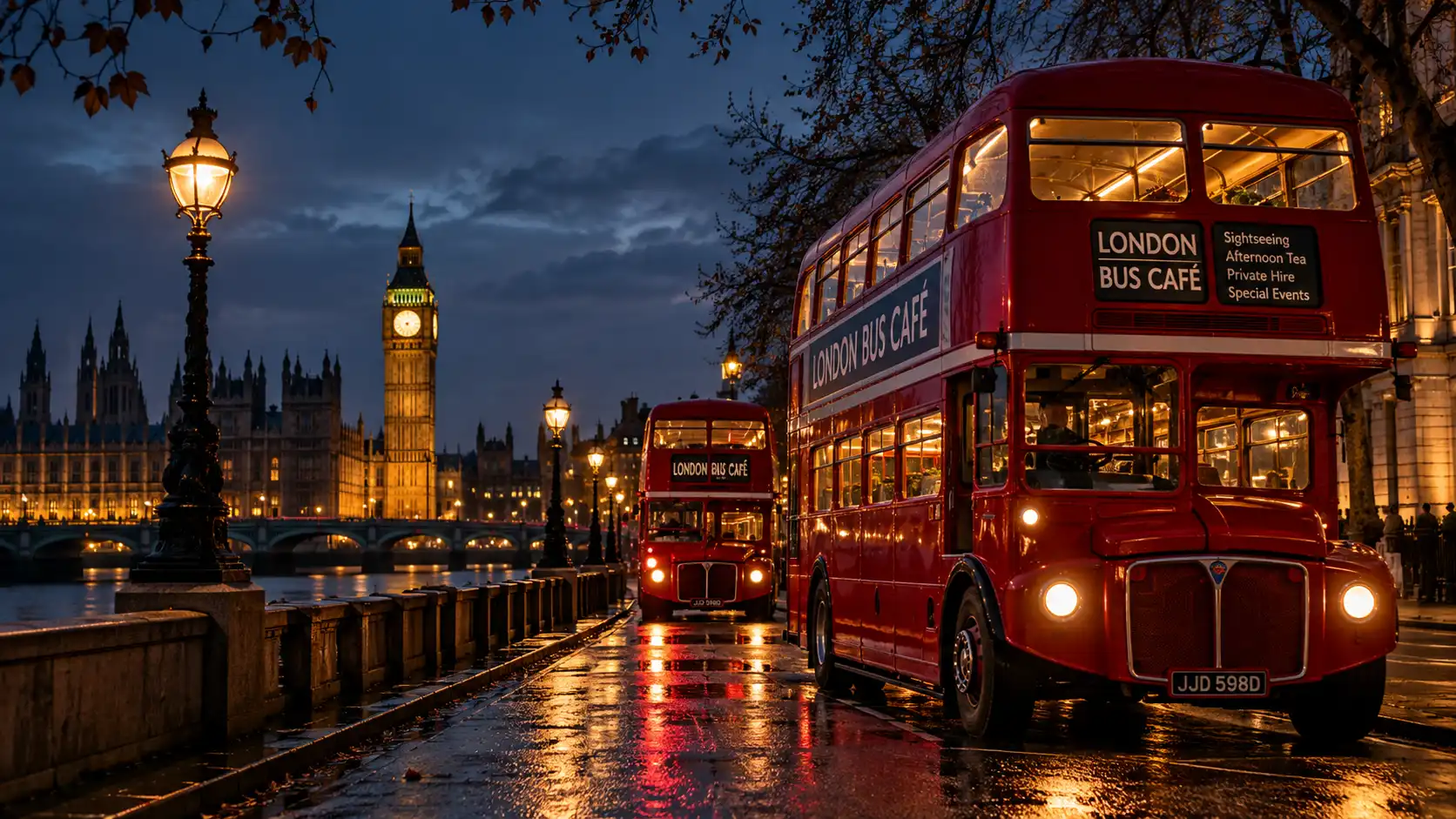 Routemasters beside the Thames at night